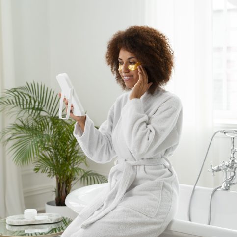side-view-woman-wearing-bathrobeee